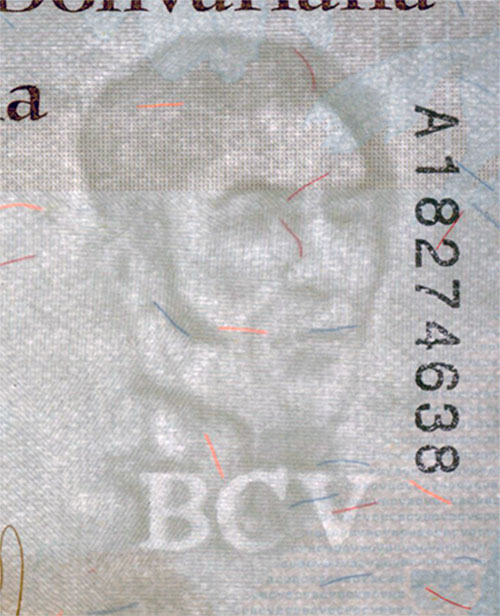 Piece bbcv1000000bss-ab01-a8 (Obverse, partial, in front of light)