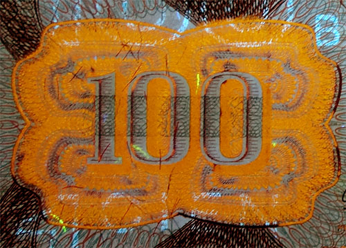 Piece bbcv100bs-db01-n7 (Obverse, partial, under ultraviolet light)