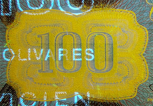 Piece bbcv100bs-db05-j8 (Obverse, partial, under ultraviolet light)