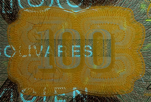 Piece bbcv100bs-dd01-p8 (Obverse, partial, under ultraviolet light)