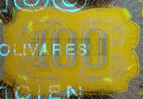 Piece bbcv100bs-dd02-l8 (Obverse, partial, under ultraviolet light)