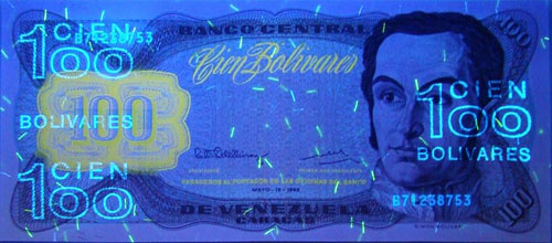 Piece bbcv100bs-dd03-b8 (Obverse, under ultraviolet light)