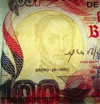Piece bbcv100bs-ea01-a8 (Obverse, partial, in front of light)