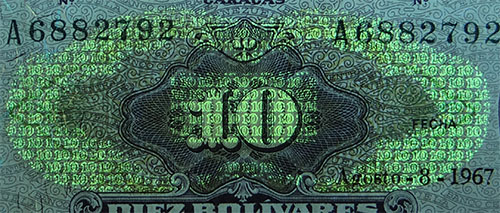 Piece bbcv10bs-da04-a7 (Obverse, partial, under ultraviolet light)