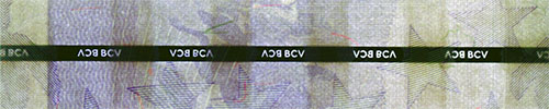 Piece bbcv10bsd-aa01-a8 (Obverse, partial, in front of light)