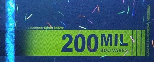 Piece bbcv200000bss-aa01-a8 (Reverse, partial, under ultraviolet light)