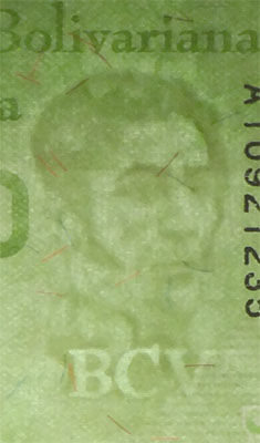 Piece bbcv20000bss-aa01-a8 (Obverse, partial, in front of light)