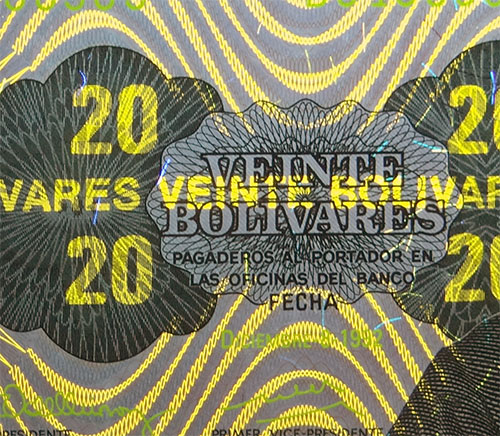 Piece bbcv20bs-fe01-d8 (Obverse, partial, under ultraviolet light)