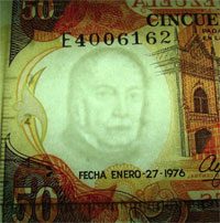 Piece bbcv50bs-ea03-e7 (Obverse, partial, in front of light)